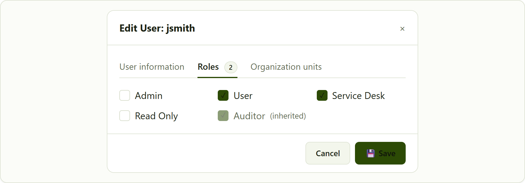 the Roles tab of the Edit User dialog. Tick the roles to grant; a greyed role is inherited from an organisation unit.
